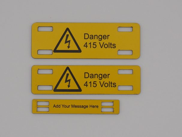 Three yellow warning labels showing "Danger 415 Volts" and a space for custom messages.